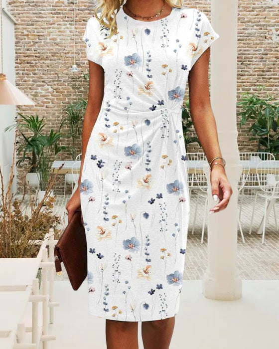 Blommig klänning med korta ärmar