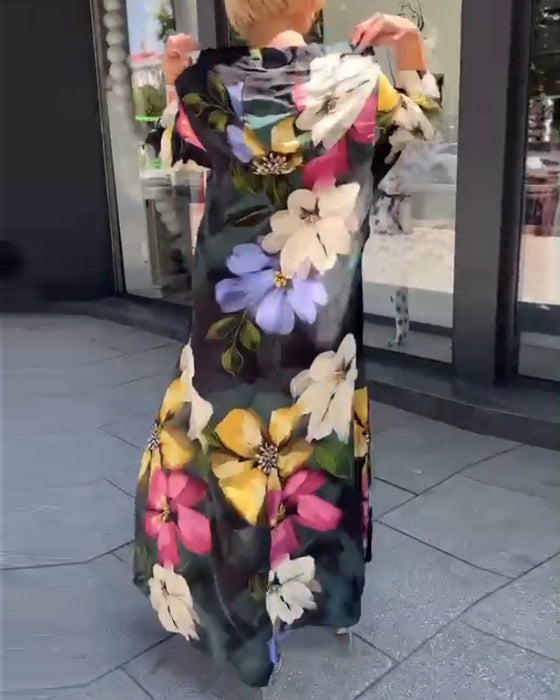 Blommig klänning med 3/4-ärm