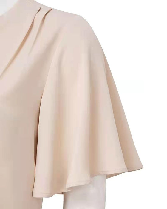 Topp med eleganta veck