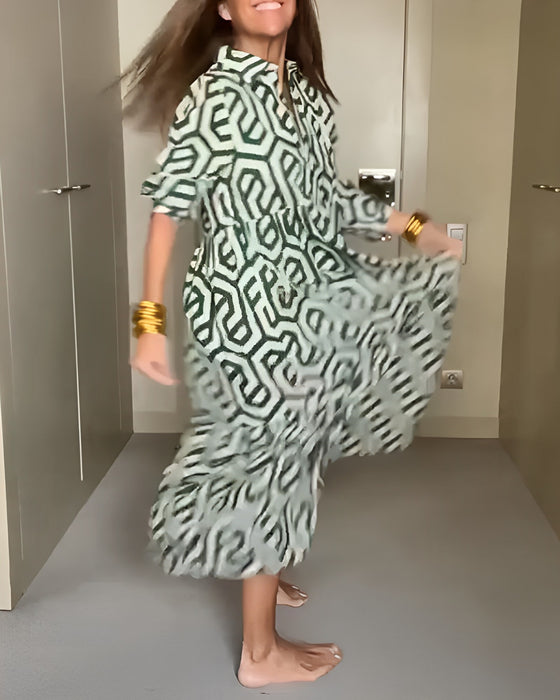 Klänning med nio punkters ärm och geometriskt tryck