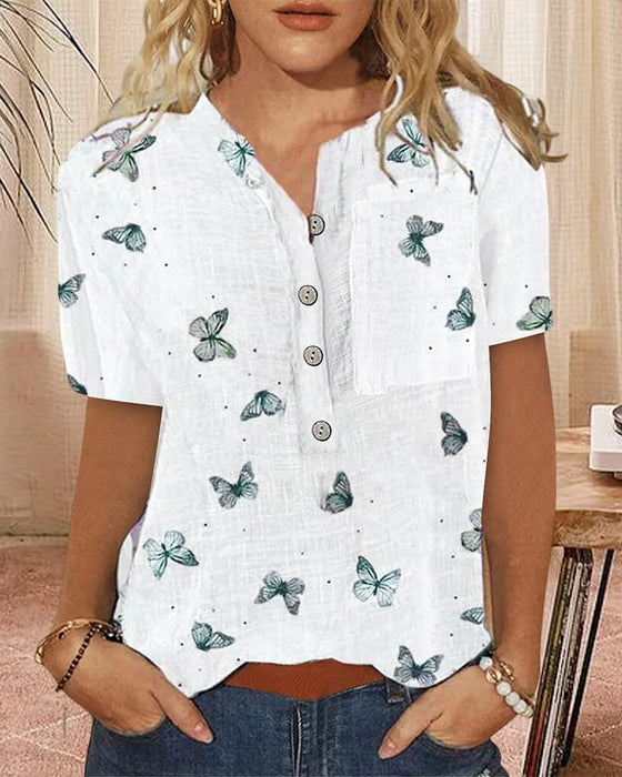 Topp med tryckt med kortärmad