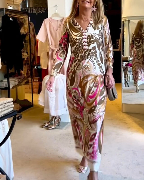 V-ringad lång klänning med tryck