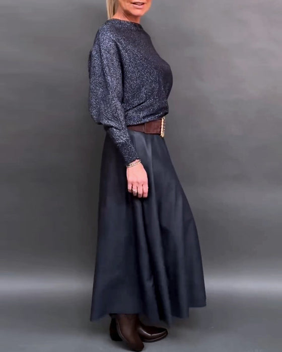 Glänsande topp med rund hals och dolmanärm