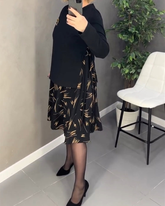 Avslappnad klänning med lös passform och rund hals