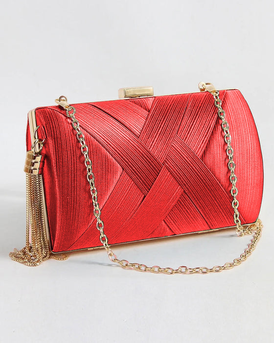 Väska med tofs med hålla i handen