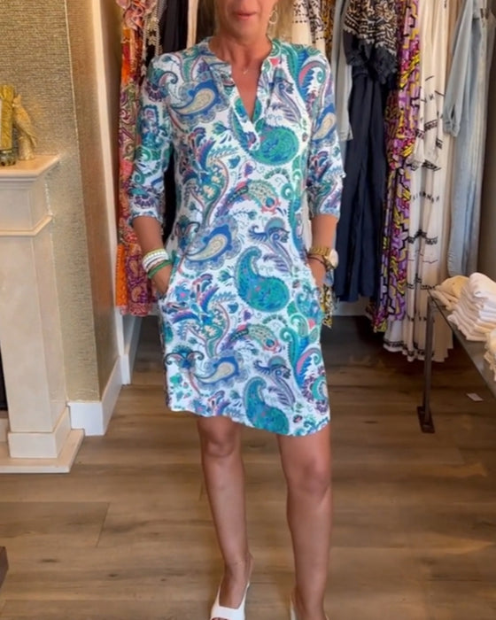 Klänning med 3/4-ärmar och fickor