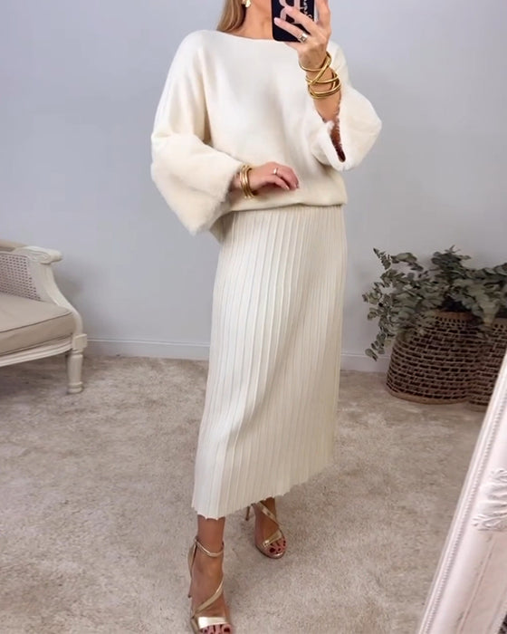 Elegant enfärgad pullover med långa ärmar