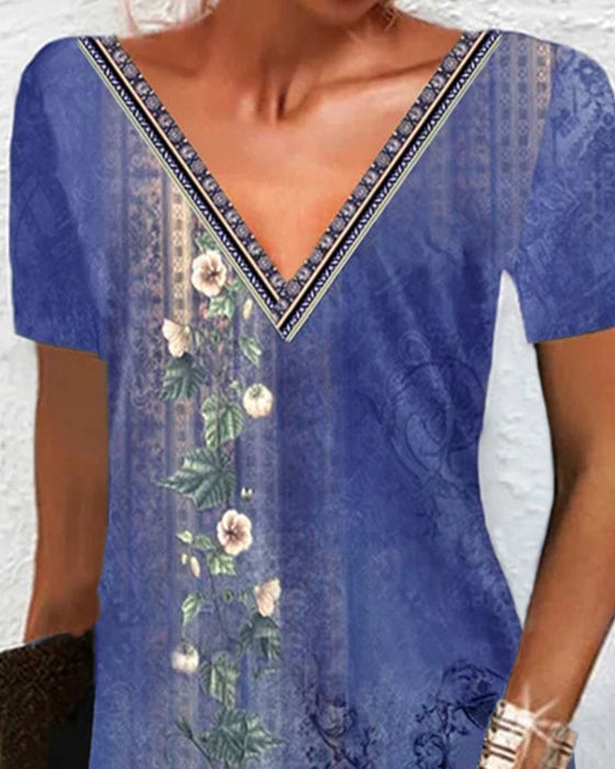 Blommig klänning med korta ärmar