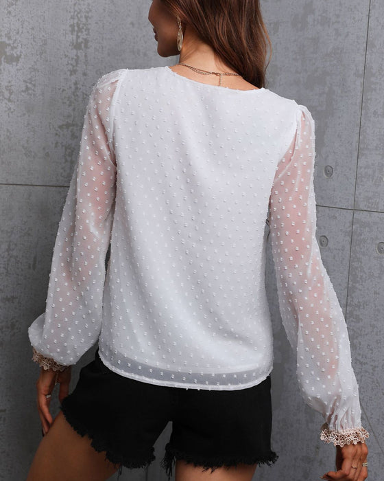 Enfärgad långärmad blusar med spets