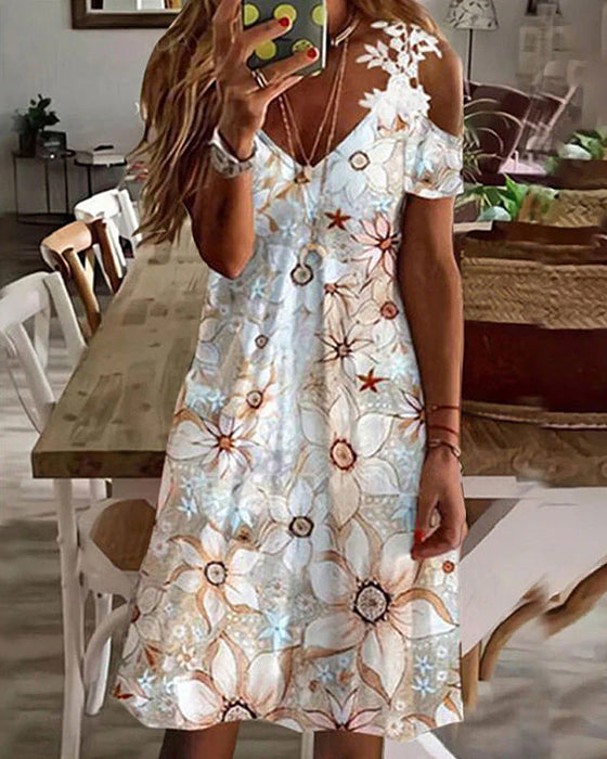 Blommig strandsolklänning