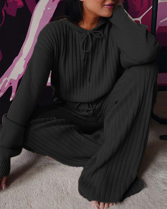 Lös långärmad kostym med huva