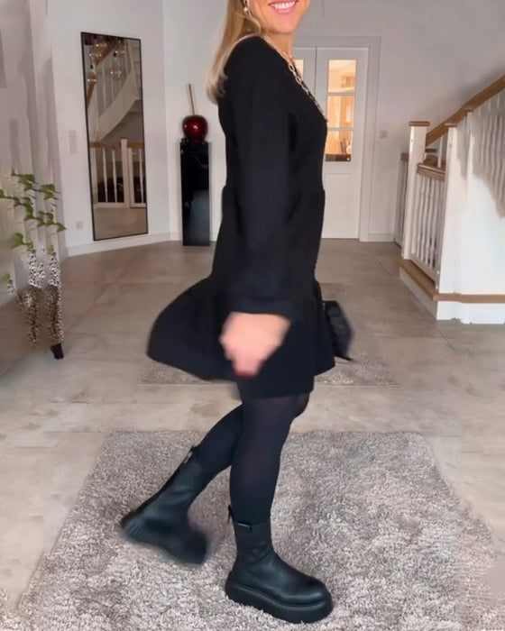 Enkel enfärgad långärmad klänning