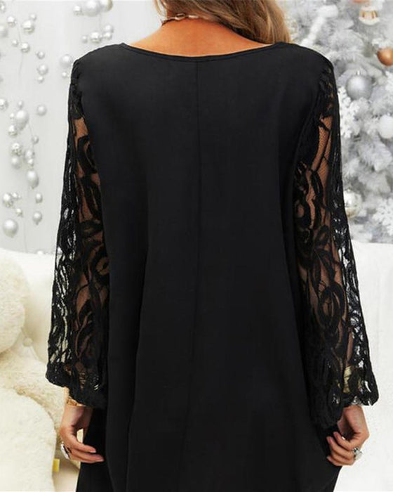 Svart klänning med spetsärmar