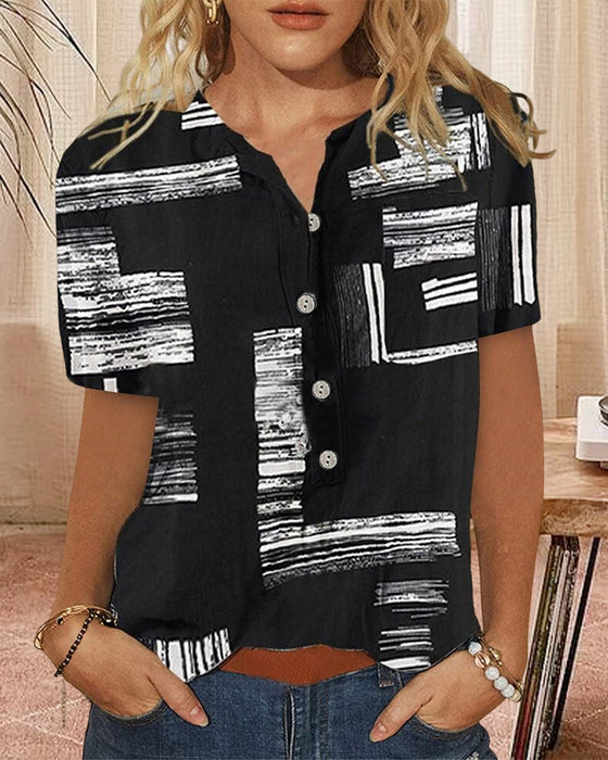 Topp med tryckt med kortärmad