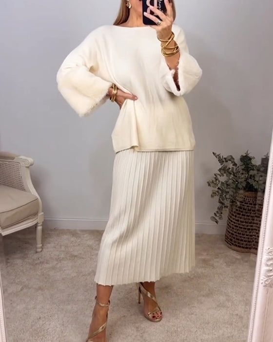 Elegant enfärgad pullover med långa ärmar