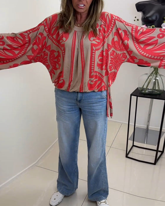 Långärmad avslappnad topp med rund hals med tryck