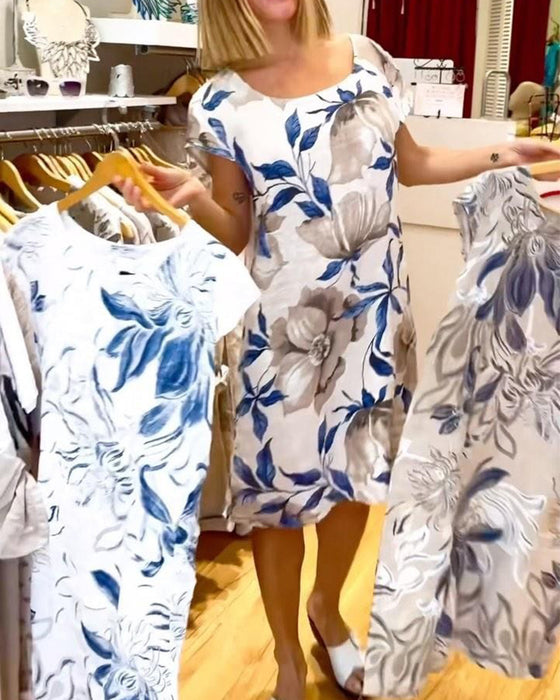 Elegant kortärmad klänning med blommönster