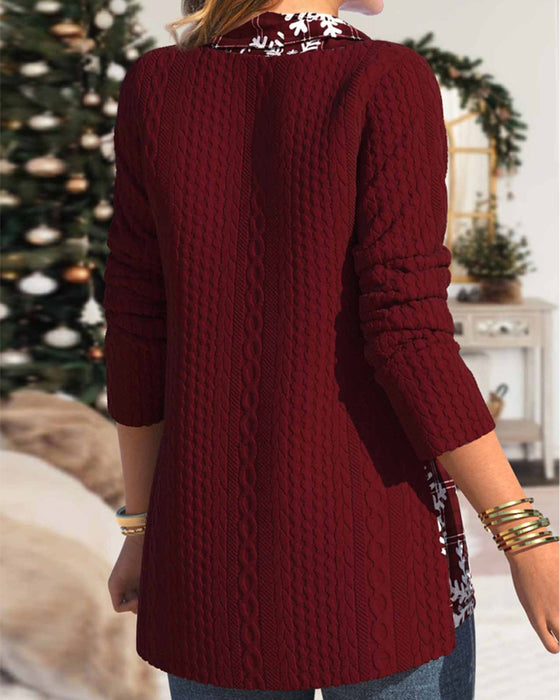 Topp med hög krage med snöflingatryck