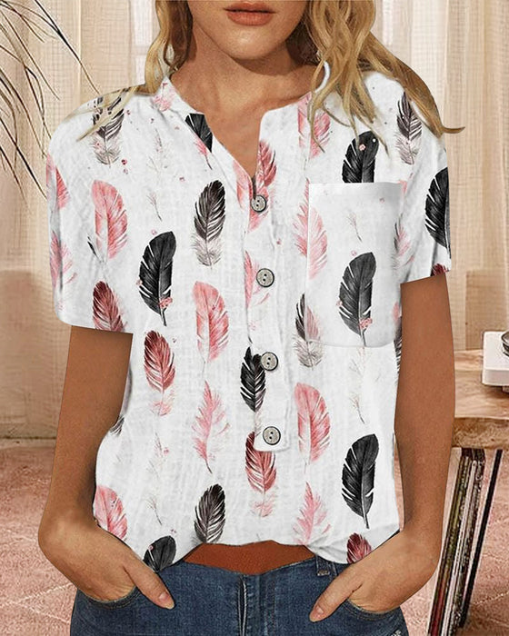 Topp med tryckt med kortärmad