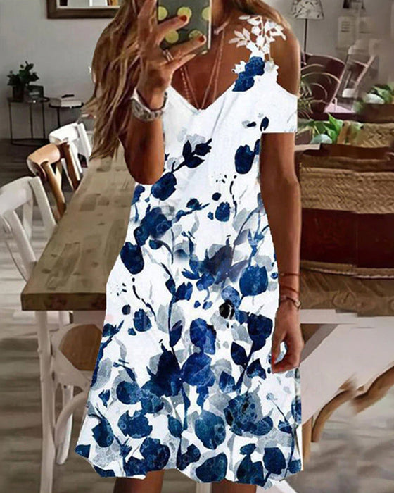 Blommig strandsolklänning