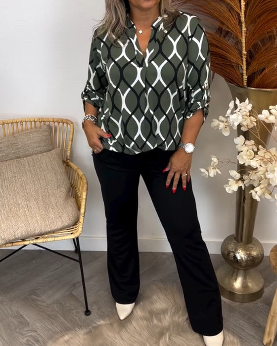 Avslappnad blus med långa ärmar och tryck