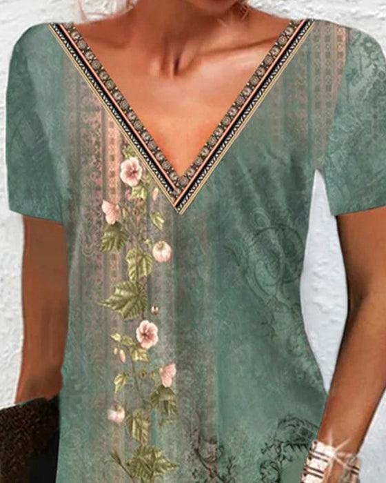 Blommig klänning med korta ärmar