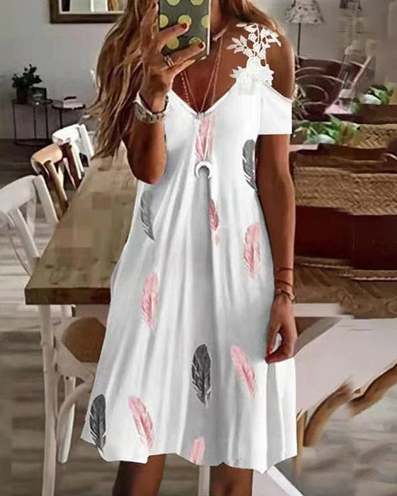 Blommig strandsolklänning