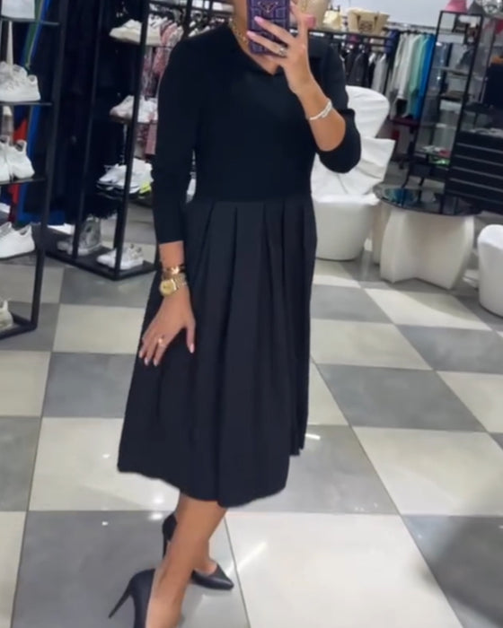 V-ringad plisserad klänning med panel