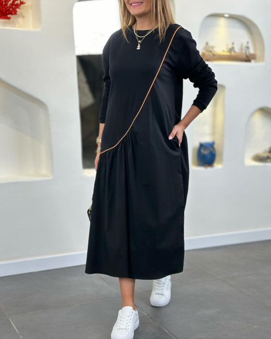 Skiftklänning med ficka och långärmad