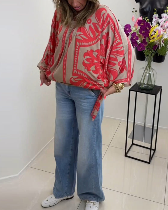 Långärmad avslappnad topp med rund hals med tryck