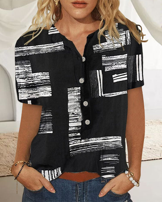 Topp med tryckt med kortärmad