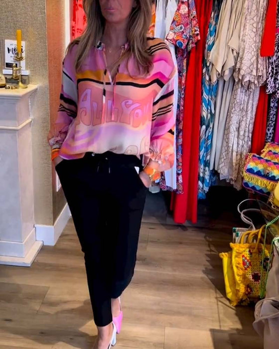 Casual topp med fjädring i kontrasttryck