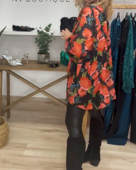 Blus med blommönster och lös passform