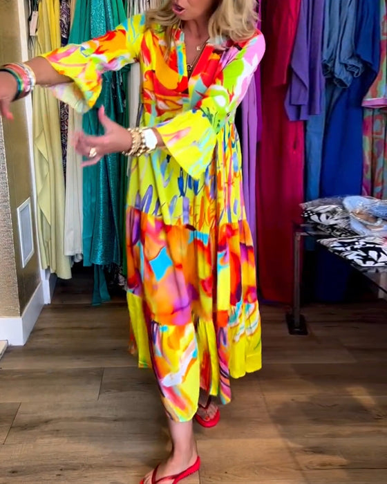 Klänning med utsvängd ärm och tryck