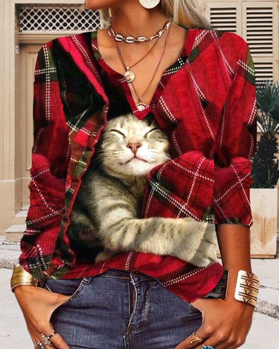 Topp med kattpaneler och långa ärmar