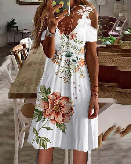 Blommig strandsolklänning