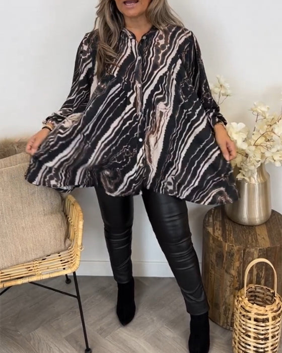 Blus med retrostil och långa ärmar