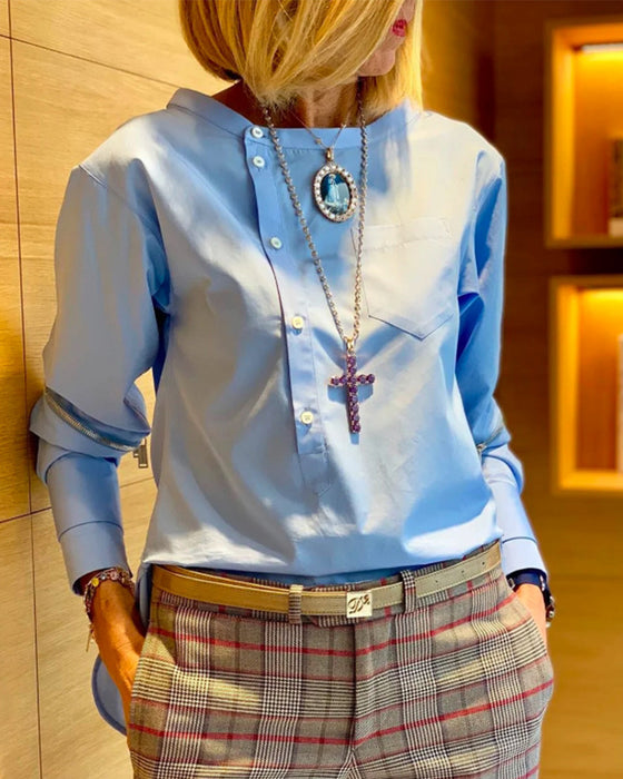 Enfärgad oregelbunden topp med knäppning