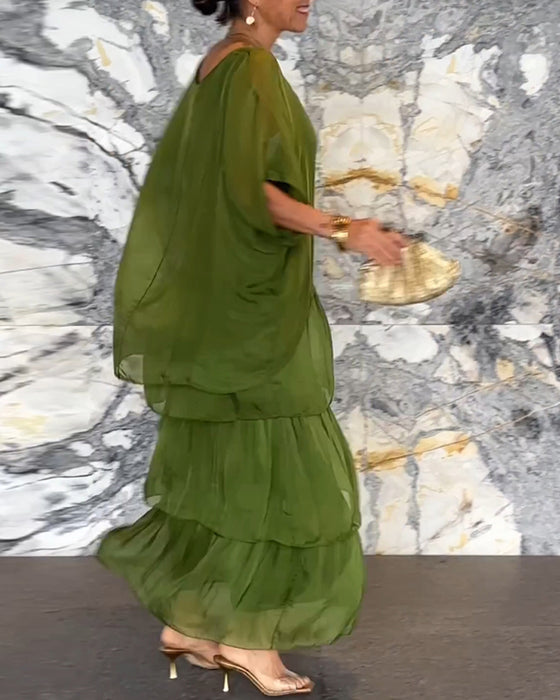 Klänning med konstnärlig stil och lös passform