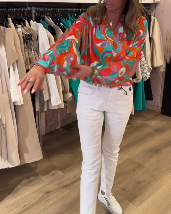 Blus med lösa pendlarstilar och tryck