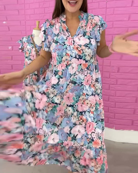 Blommig V-ringad avslappnad kortärmad klänning