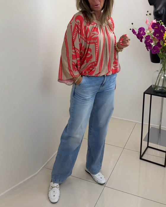 Långärmad avslappnad topp med rund hals med tryck