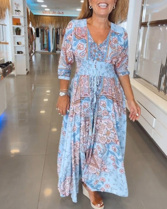 3/4-ärmad semesterklänning med V-ringning