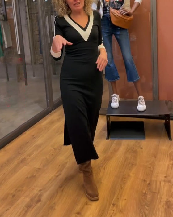 Klänning med V-ringning och 3/4-ärmar