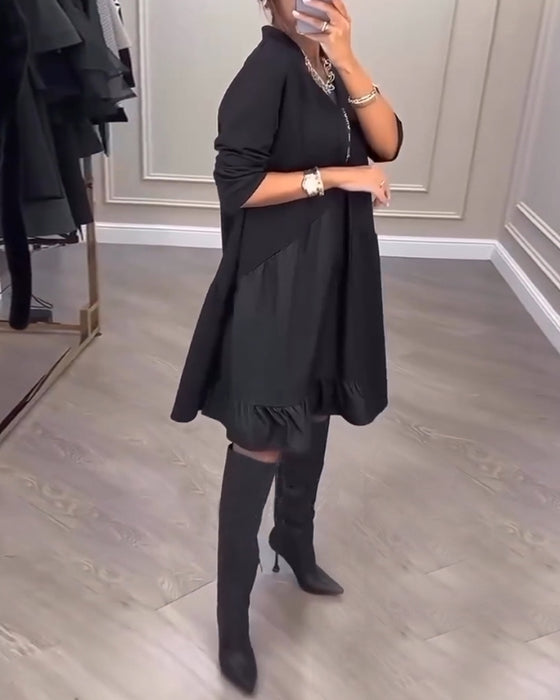 V-ringad Klänning med konstnärlig känsla