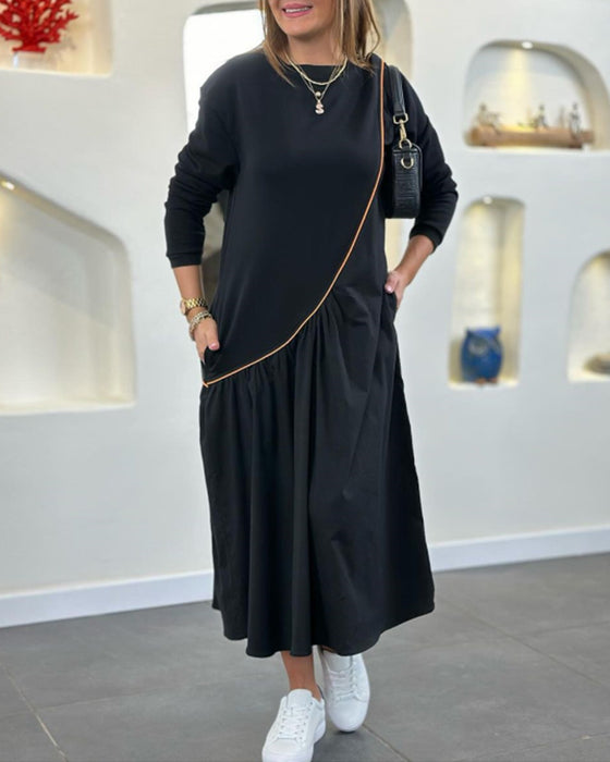 Skiftklänning med ficka och långärmad