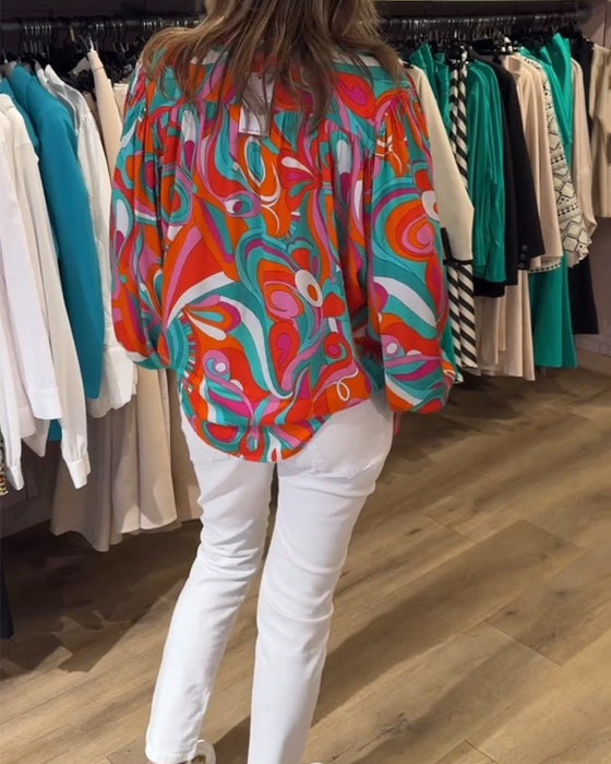 Blus med lösa pendlarstilar och tryck