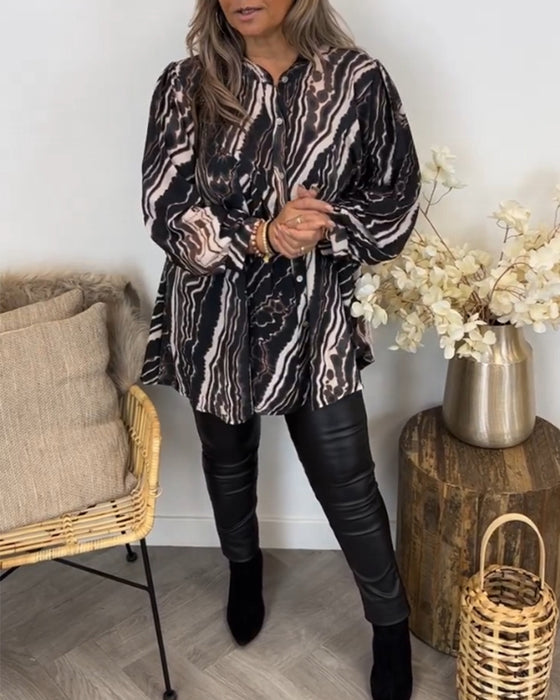 Blus med retrostil och långa ärmar