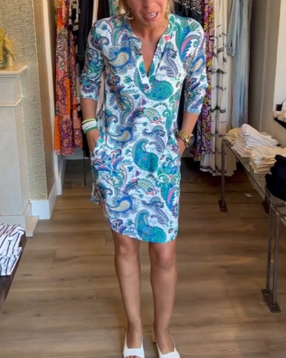 Klänning med 3/4-ärmar och fickor