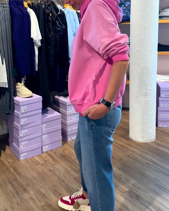 Avslappnad luvtröja med lutning